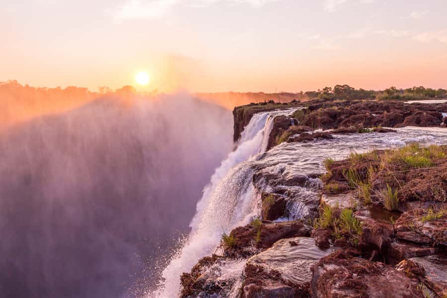 From Victoria Falls: Livingstone Island Tour & Devils Pool - Crossing from Victoria Falls into Zambia