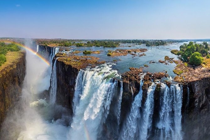 Full Day Victoria Falls incl lunch & Devils Pool 10h ZIMBABWEAN & ZAMBIAN SIDE - Crossing into Zambia with help at the border