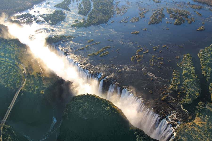GUIDED TOUR OF THE VICTORIA FALLS ON THE ZAMBIAN SIDE - Pickup from Livingstone and the road to the falls