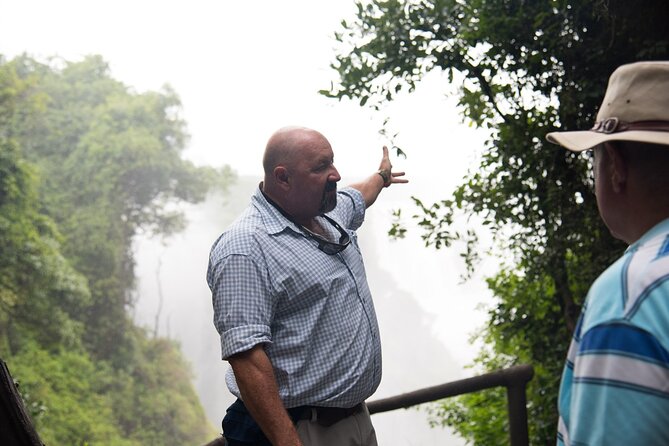 Guided Tour of Victoria Falls with Pickup - Entering the spray-fed rainforest