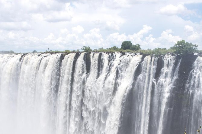 Half Day Livingstone City, Museum and Victoria Falls Tour - What the guide adds to the experience