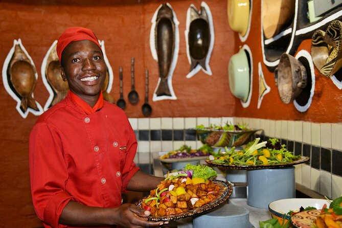 The Boma Dinner, Dance And Drum Show In Victoria Falls - The hand washing ceremony and local brew