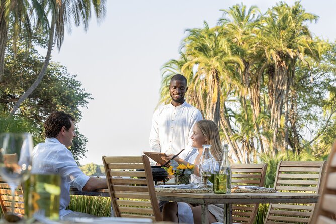 The Eatery Dinner Experience in Victoria Falls - Gathering around the fire-pit
