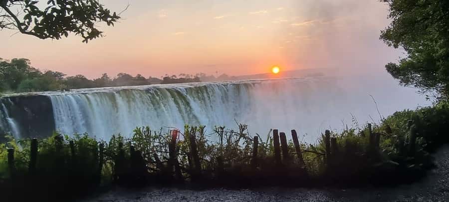 Victoria Falls Scenic Day Tour with Lunch & Helicopter Tour - The Curio Market and Big Tree add a gentle finish