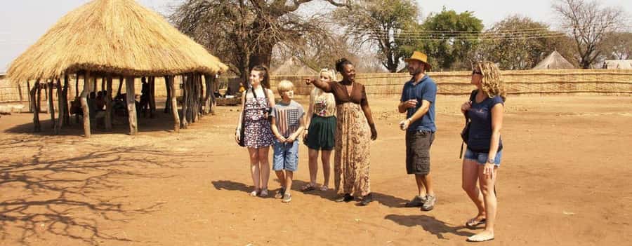Victoria Falls: Village Tour with Traditional Food Tasting - What the hotel pickup adds
